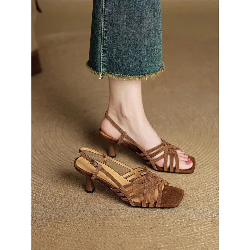 Women's beige retro sandals with thin cross-straps, an ankle buckle, and a 3-6cm mid-heel on a square toe.