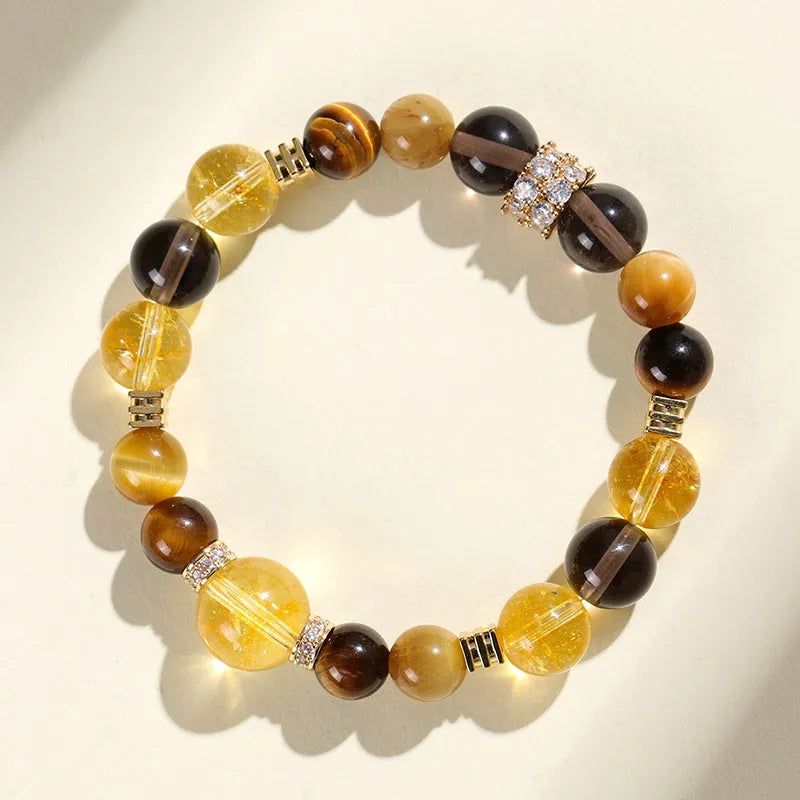 Natural yellow 10mm tower crystal string beads bracelet on wrist