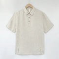 Men's loose-fit short-sleeve linen top in gray green on a hanger