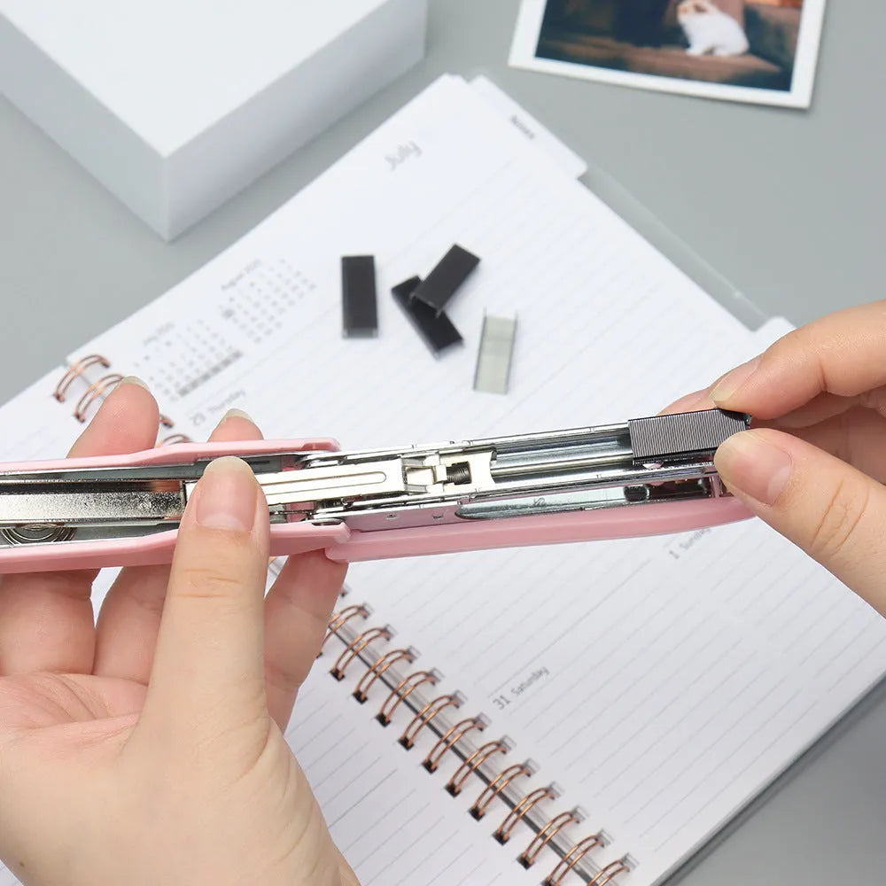 Box of 1000 metal office staples in four colour options: black, purple, rose gold and rose red