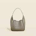 Top layer cowhide genuine leather women's shoulder bag in camel colour, horizontal square shape with sewing thread detail