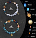 Two natural stone beaded bracelets for zodiac signs on a wooden background, showing adjustable elastic cord.