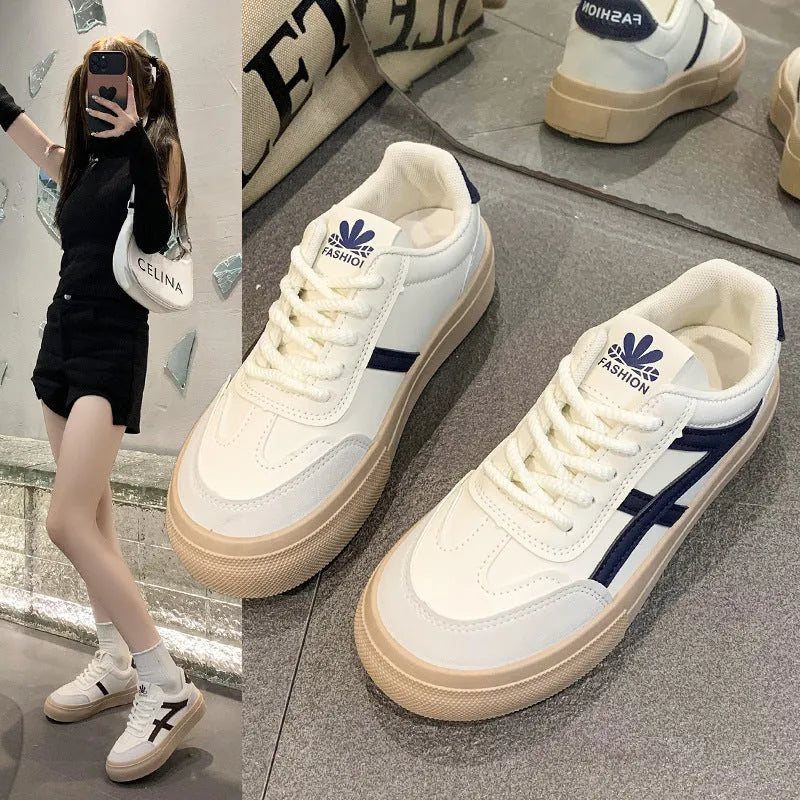Low-top brown and blue casual board shoes with patent leather upper and flat rubber sole