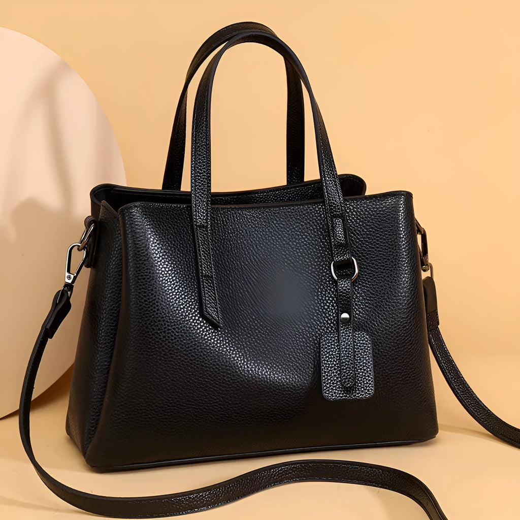 Women's genuine cowhide leather handbag in horizontal square shape with single shoulder strap
