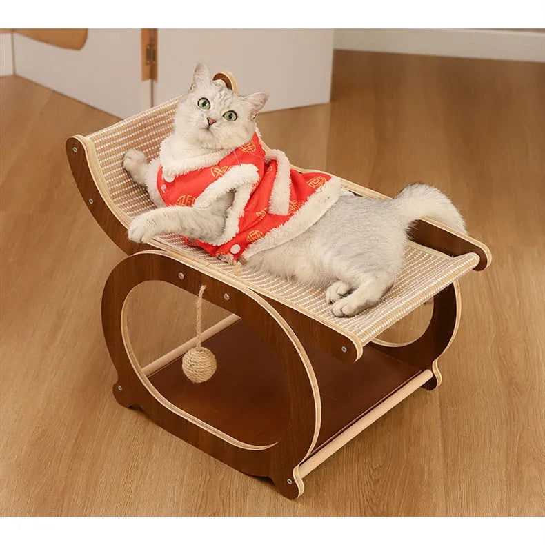 Solid wood cat bed with sisal scratching surface and recessed sleeping area in walnut colour finish.