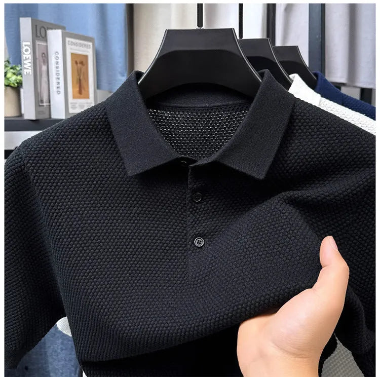Men's loose grey short sleeve cotton sweater on a hanger