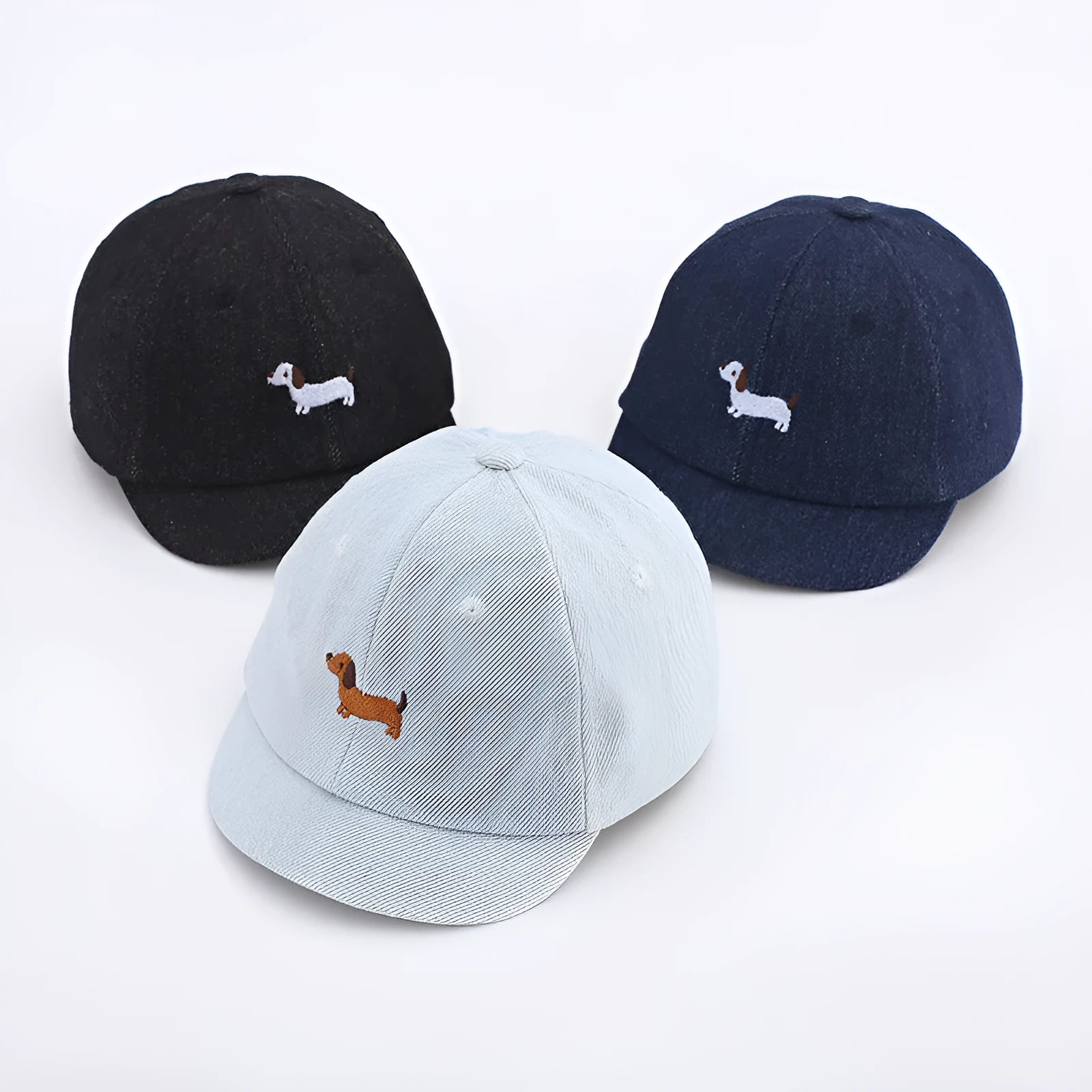 Denim puppy print baseball cap for babies with dome crown and short brim in black, dark blue, or light blue