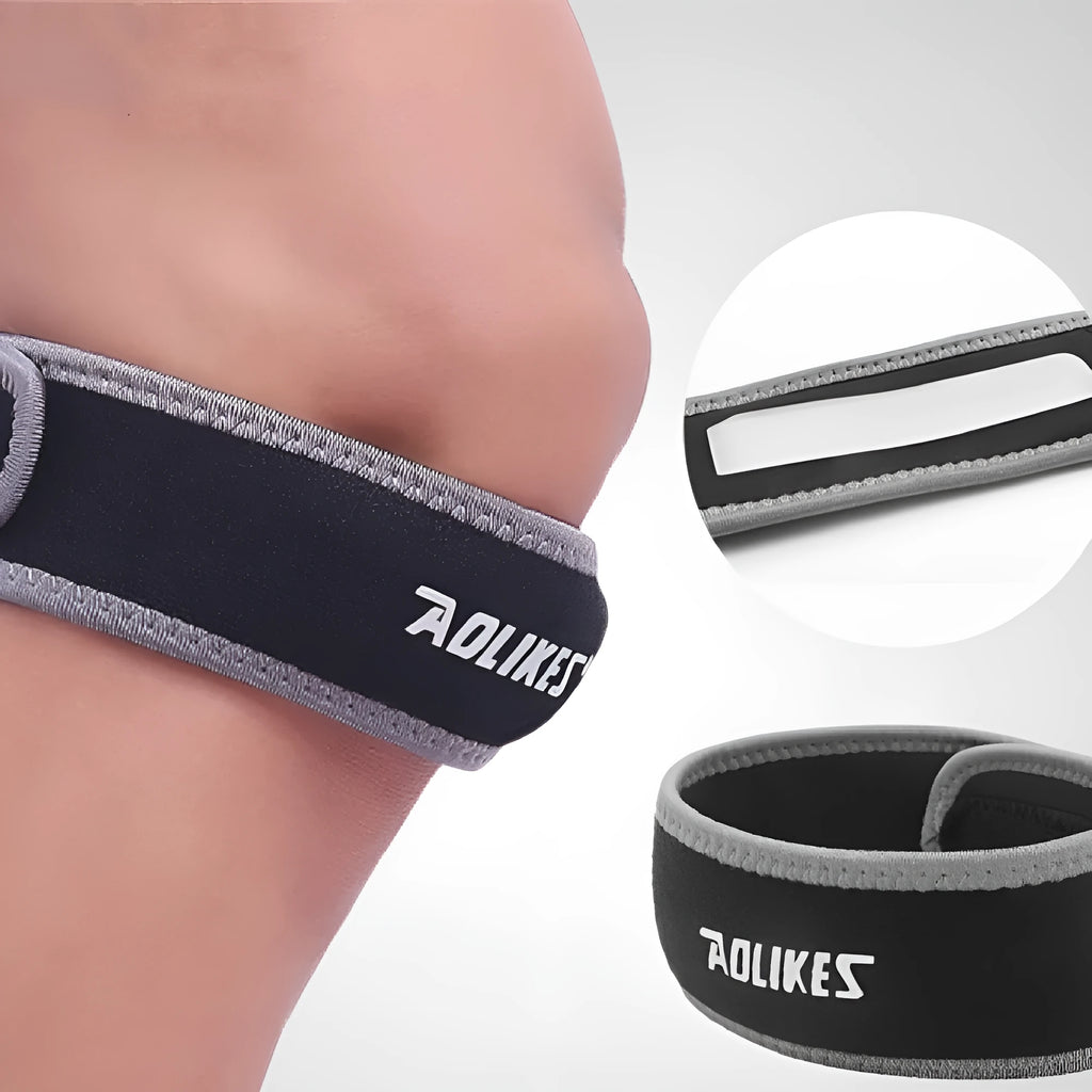 Black and grey patella retinaculum knee support for running and sports.