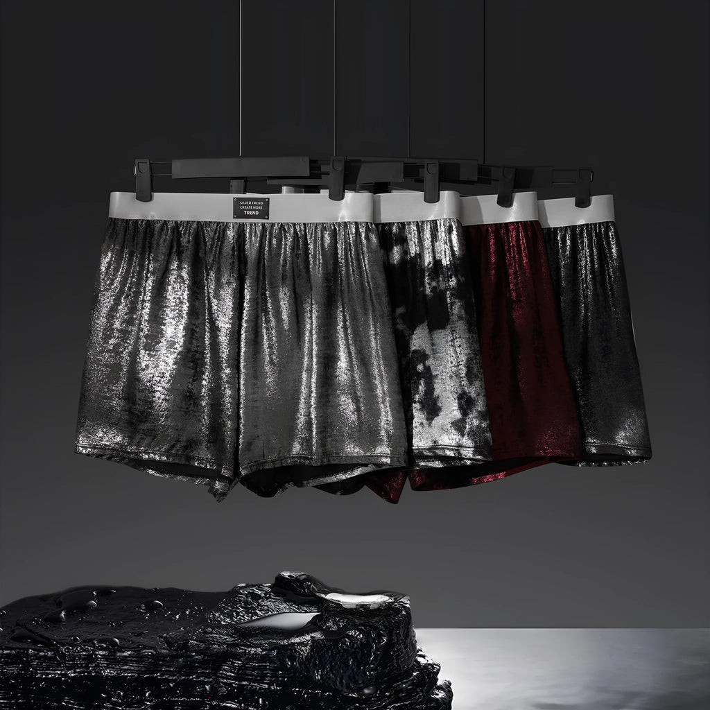 Men's reflective bright silver woven polyester sport underwear on a mid-rise waist.
