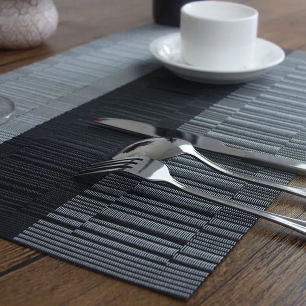 PVC non-slip kitchen sink placemat in gradient bamboo or infinite long colours on a counter.