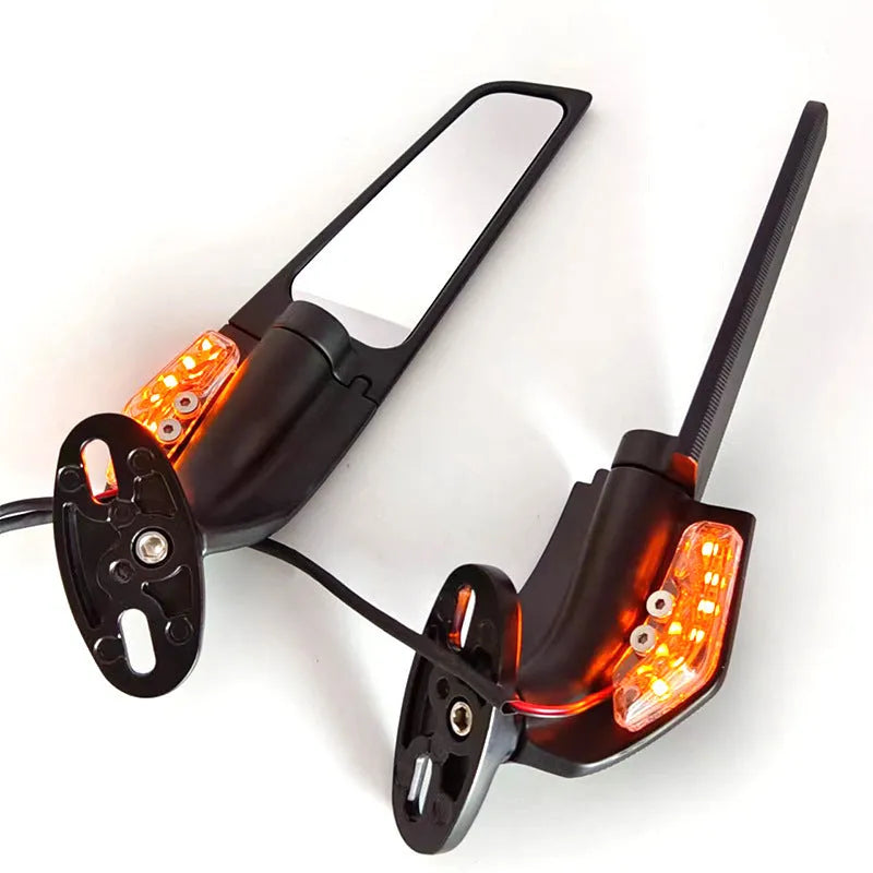 Pair of aluminium motorcycle rearview mirrors with convex lenses and integrated yellow running lights.