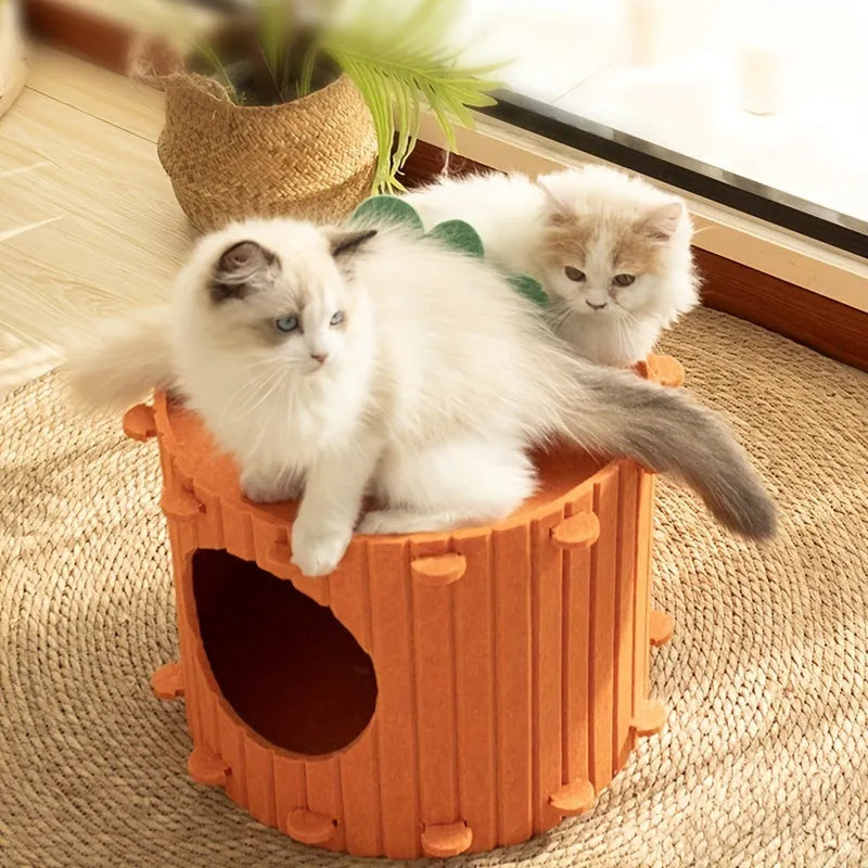 Carrot-shaped grey felt cat bed with a round tunnel entrance, shown next to a cat.