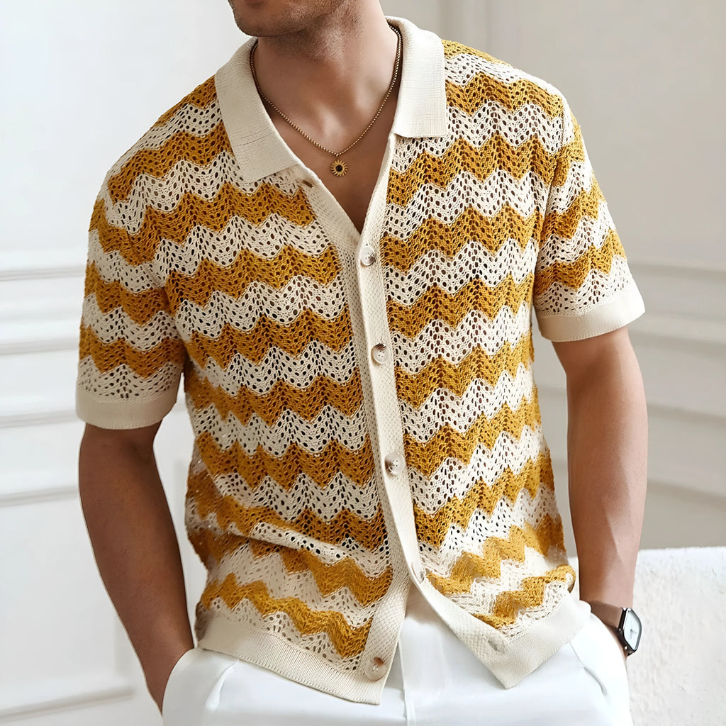 Yellow short-sleeve sweater with a raised corrugated jacquard pattern and a flocked detail on the front.