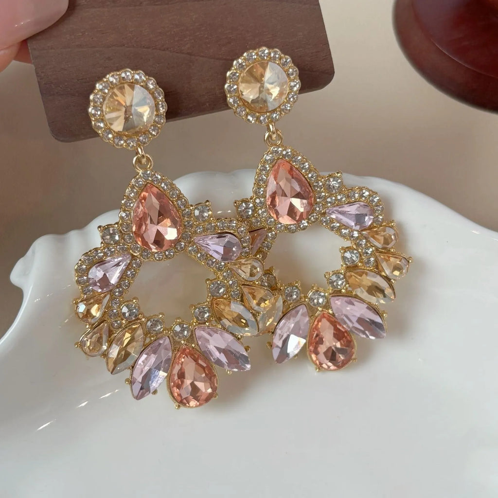 Pair of geometric rhinestone earrings with dot pattern on alloy base for women