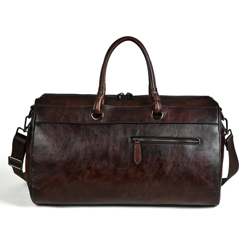 Genuine leather retro handbag in vintage brown colour showing handmade construction details