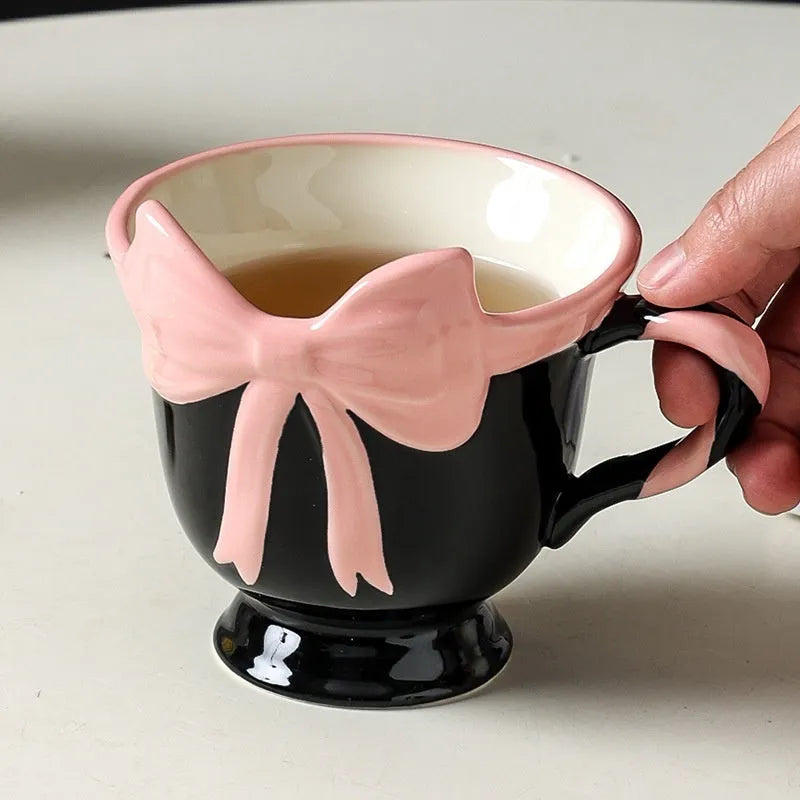 Ceramic mug with girl heart bow design in white powder or black pink colour, 301-400ml capacity