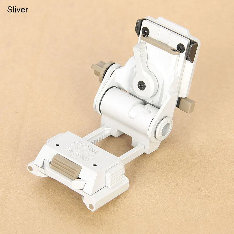 Metal alloy L4 G24 night vision helmet mount with breakaway base in dark earth colour.