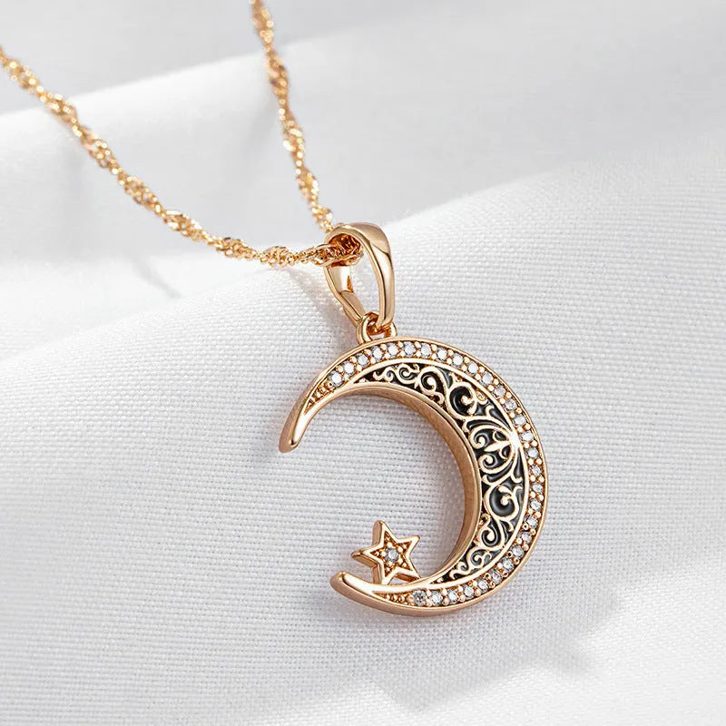 Rose gold coloured necklace with star and moon pendant on water wave chain