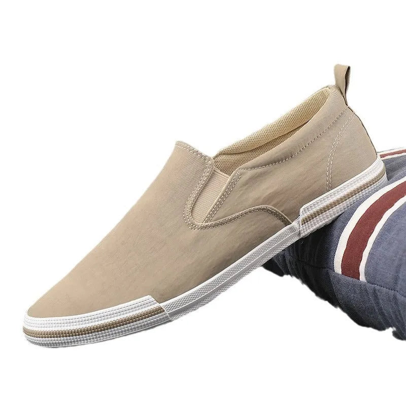 Men's low-top canvas casual shoes in grey colour with vulcanised rubber sole and round-toe design