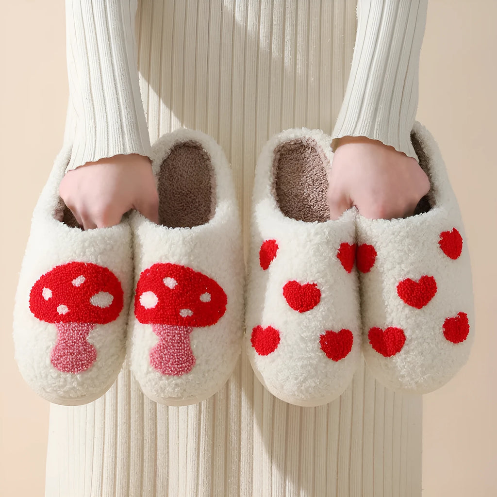 Women's plush cartoon love style slippers with a PVC sole in multiple colour options.