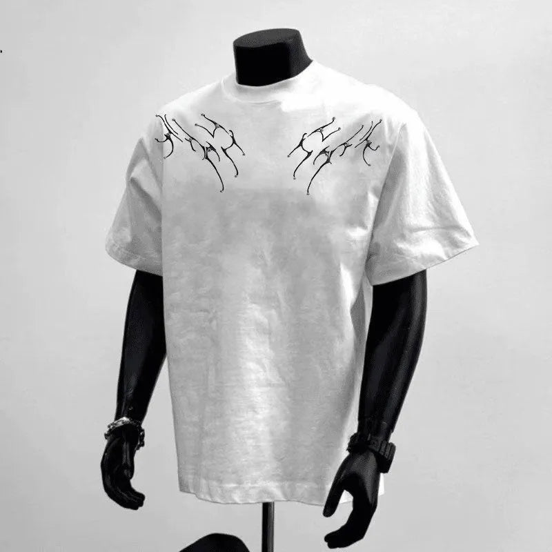 Man wearing a loose-fitting black pure cotton short sleeve top suitable for business casual wear.