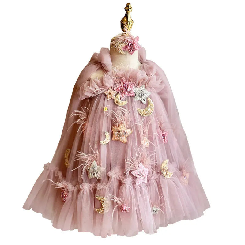 Pink children's spaghetti-strap princess dress with flower print and bow detail, cotton lining, available in 100cm to 140cm height sizes
