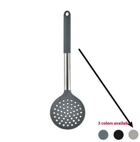 Silicone kitchen utensil set with twelve tools in a rotating white storage caddy on a counter.
