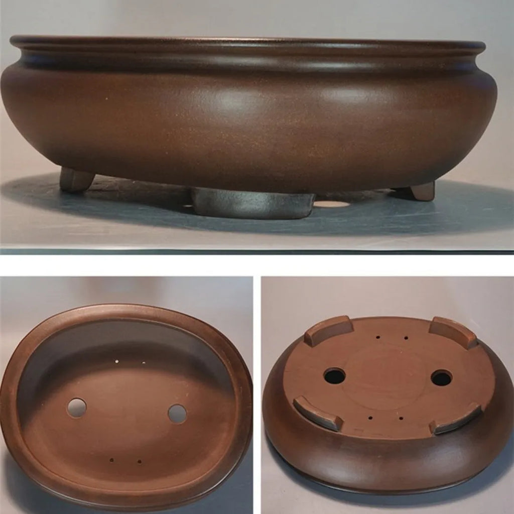 Handmade purple clay classical style desktop flowerpot on a wooden surface
