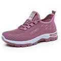 Men's and women's low-top casual sneakers with soft PVC sole in black, brown, grey, light purple, and red.