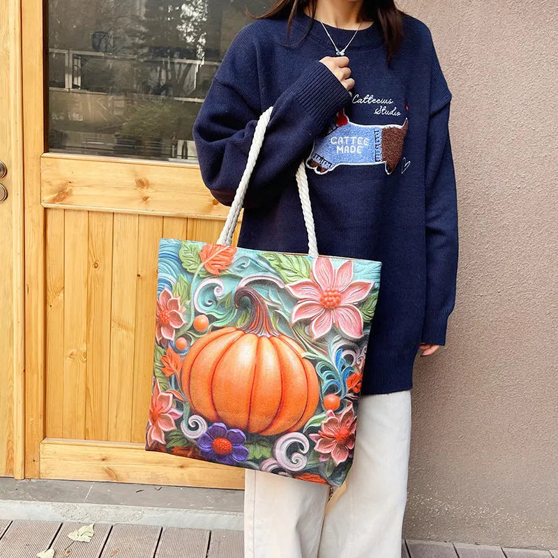 A soft cotton and linen string shoulder handbag with two straps and an open outer pocket.