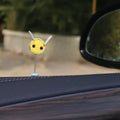 Soft fur ball Swing Spring Bee car decoration ornament measuring 3 by 3 centimetres.