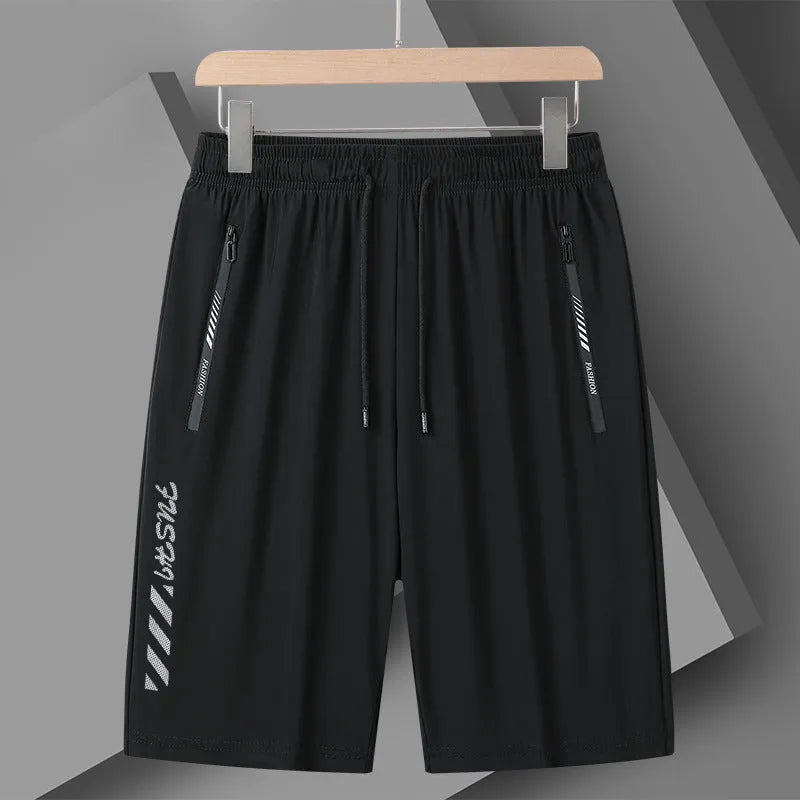 Men's black quick-drying nylon sports shorts in loose fit with fifth pants length