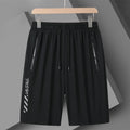 Men's black quick-drying nylon sports shorts in loose fit with fifth pants length