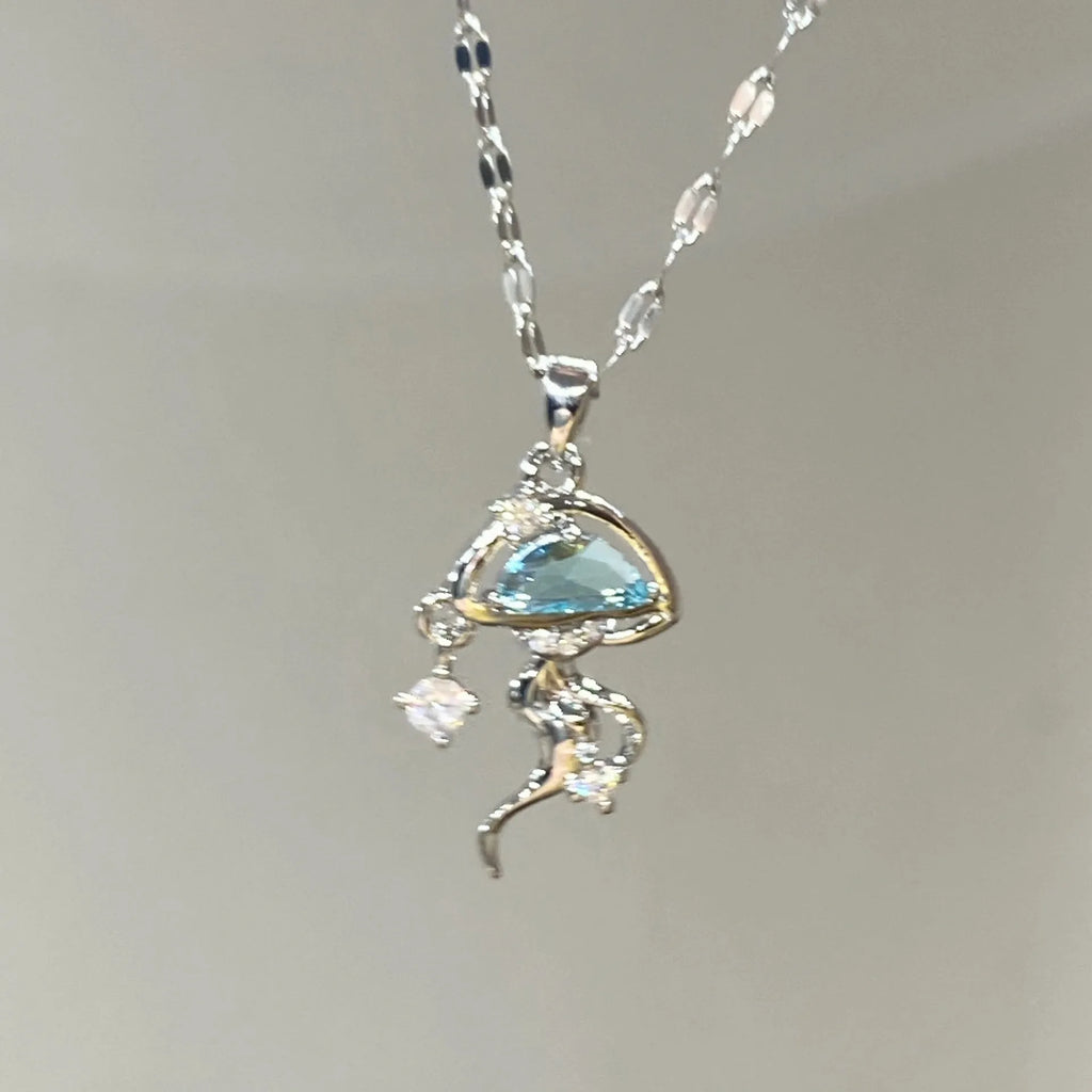 Blue jellyfish charm on sterling silver necklace with adjustable chain