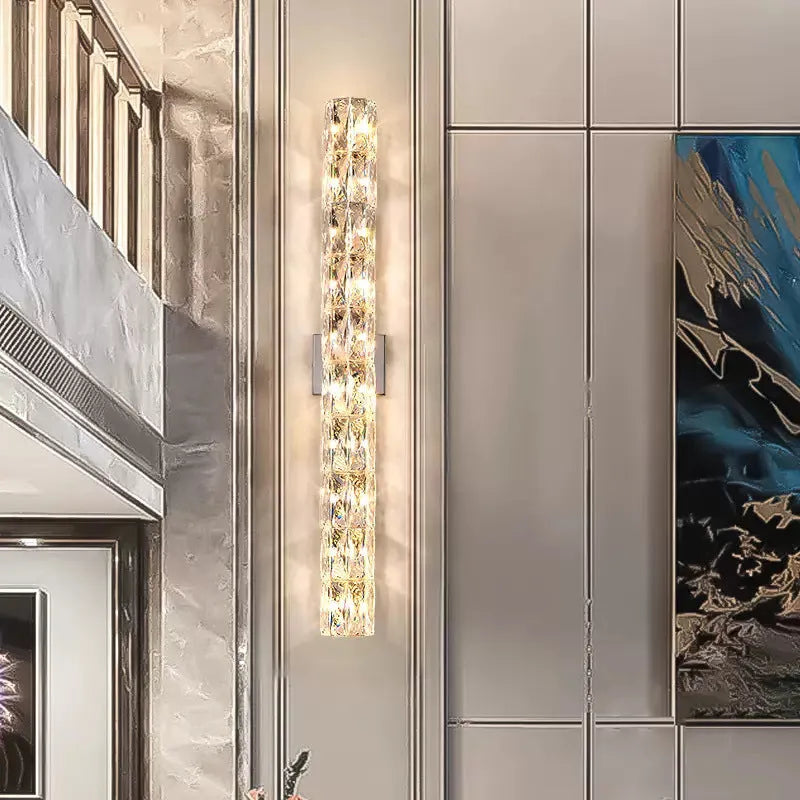 Crystal wall lamp with stainless steel body and LED lighting in chrome or gold finish