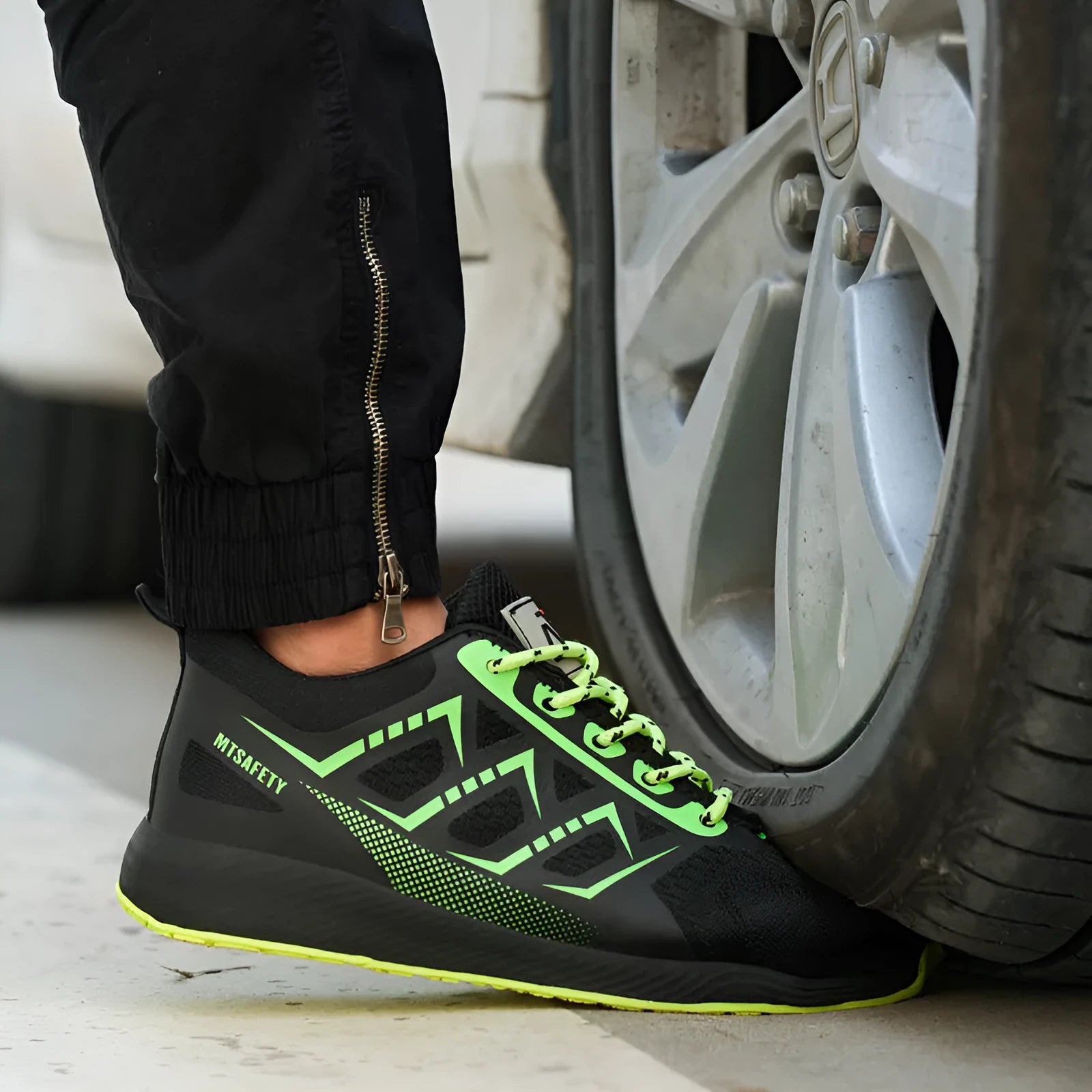 Ultra-light black steel toe safety boots with flat knitted uppers and lace-up front.