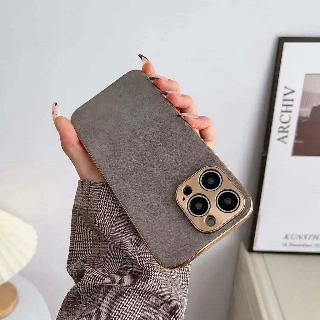 Slim black leather texture TPU phone case for iPhone showing raised edges around screen and camera.