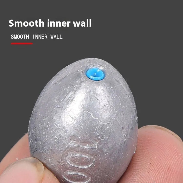 Tongxin scale pattern olive lead fishing sinker with plastic core, showing rugby shape and weight options.