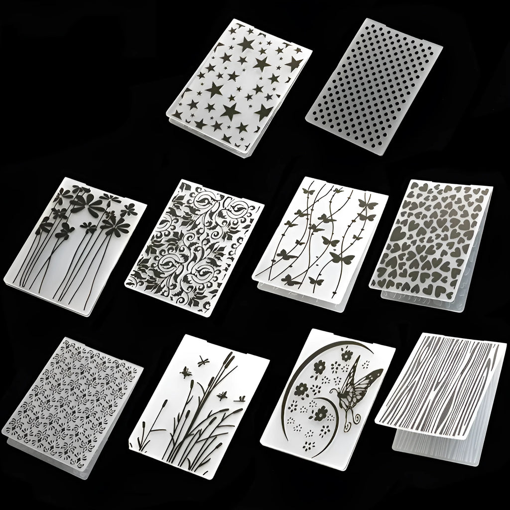 Plastic decorative cake mould with ten patterns including windmill and flower shapes, folding size 14.5x10.5 cm