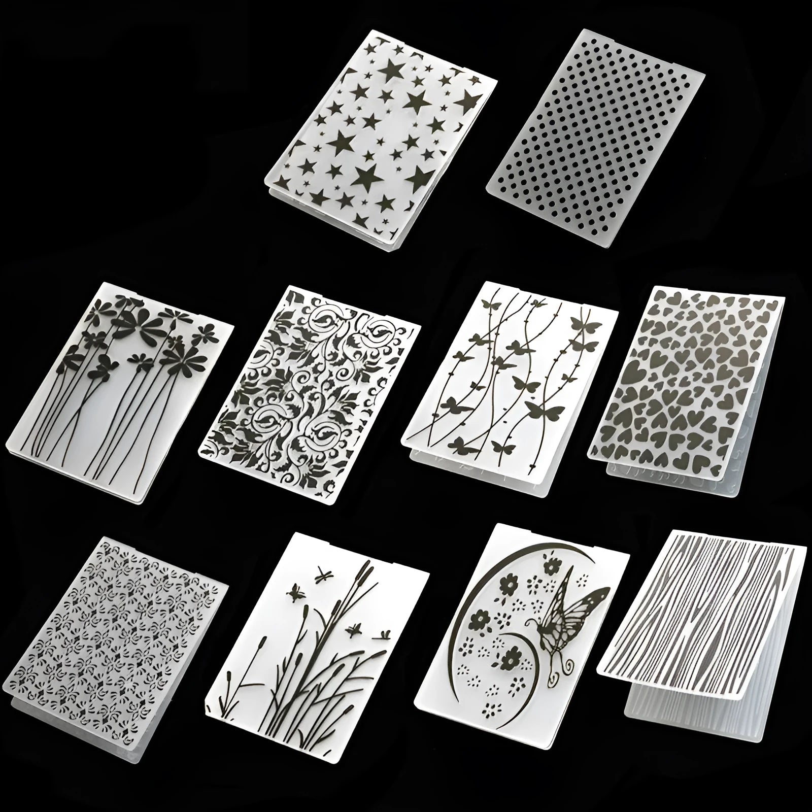 Plastic decorative cake mould with ten patterns including windmill and flower shapes, folding size 14.5x10.5 cm