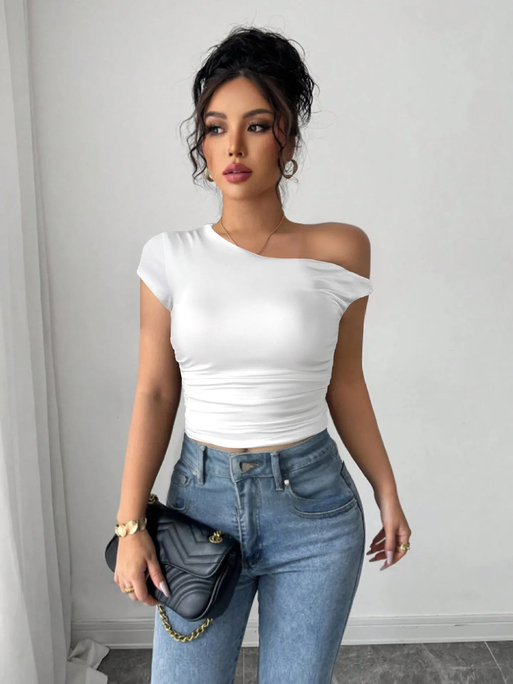 Women's white polyester slim fit pullover top with oblique shoulder neckline and raglan sleeves