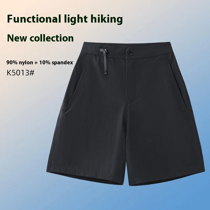 Men's solid colour sports shorts with 3D cut and stretch fabric for running.