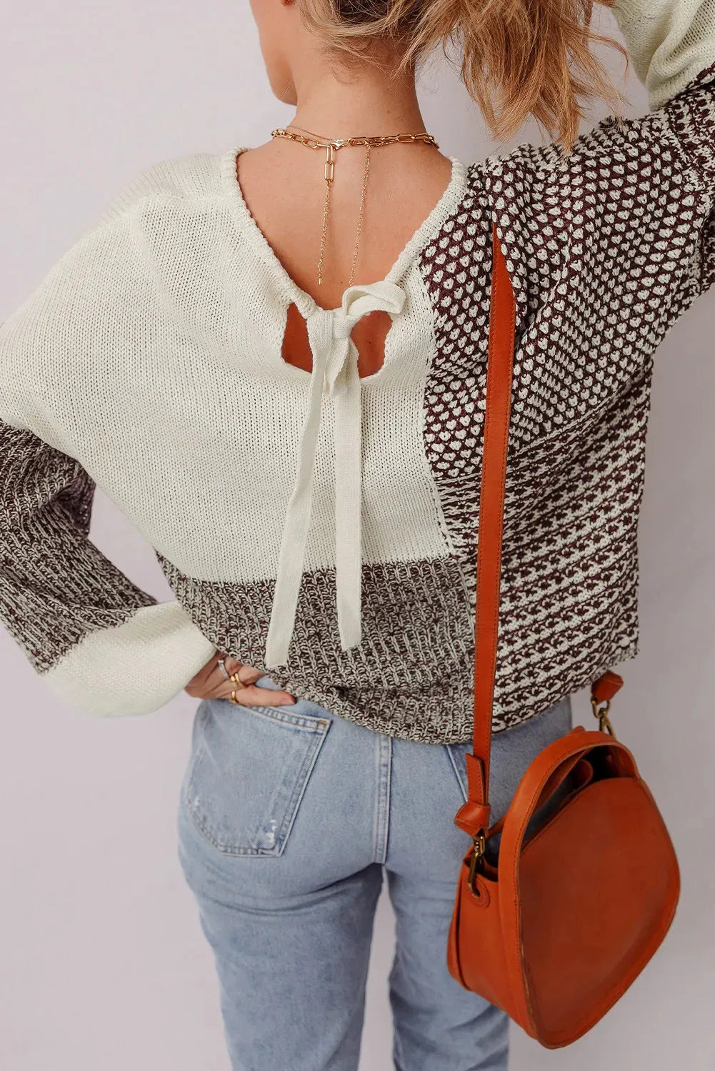 Dark khaki drop shoulder loose sweater with colour block design and a back tie.