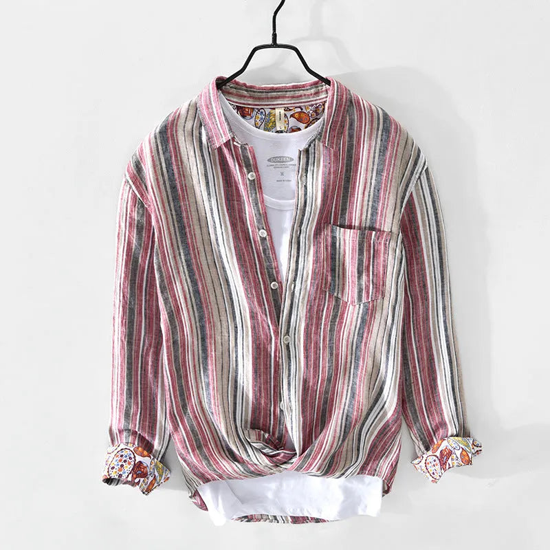 A man wearing a red and grey striped linen casual shirt with long sleeves and a loose fit.