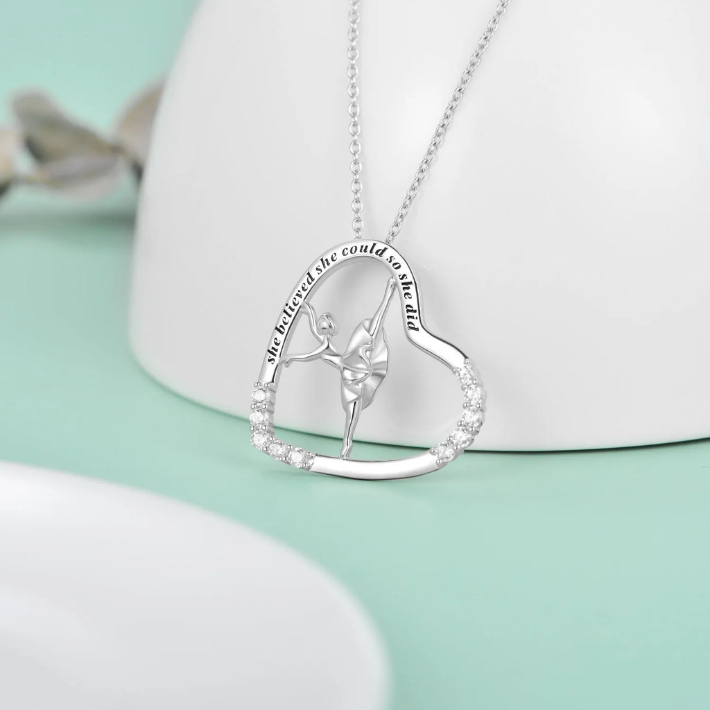925 sterling silver heart ballerina dancer pendant necklace with cubic zirconia stone on white background