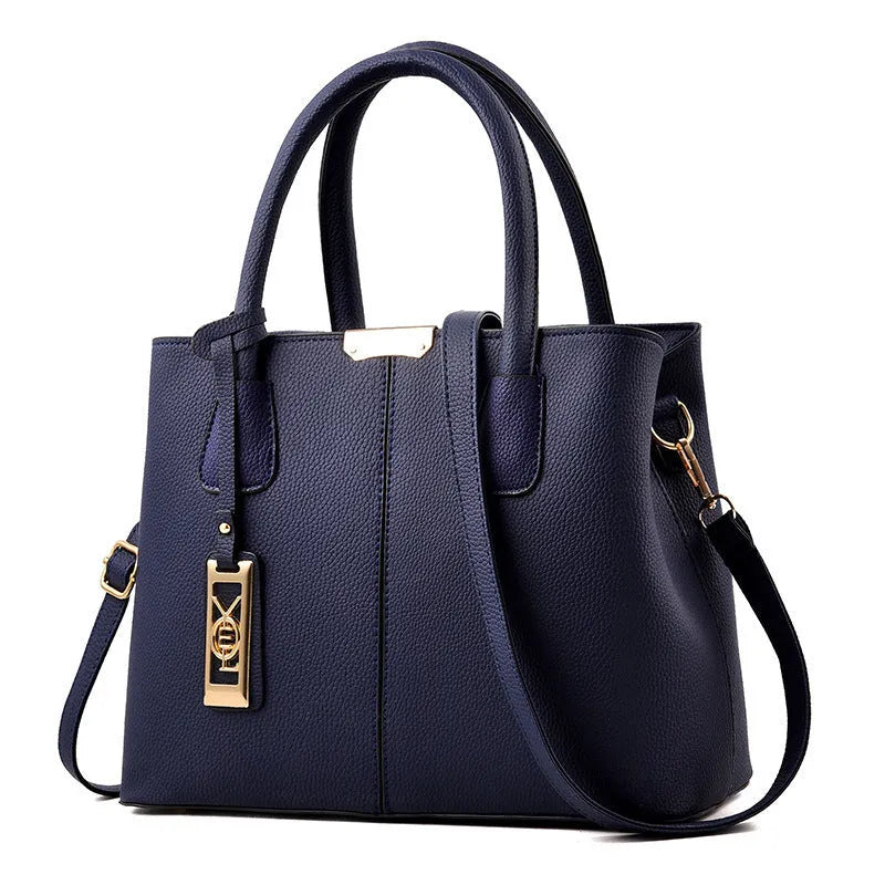 Soft PU leather large capacity shoulder bag for women in a horizontal square shape with an adjustable strap.