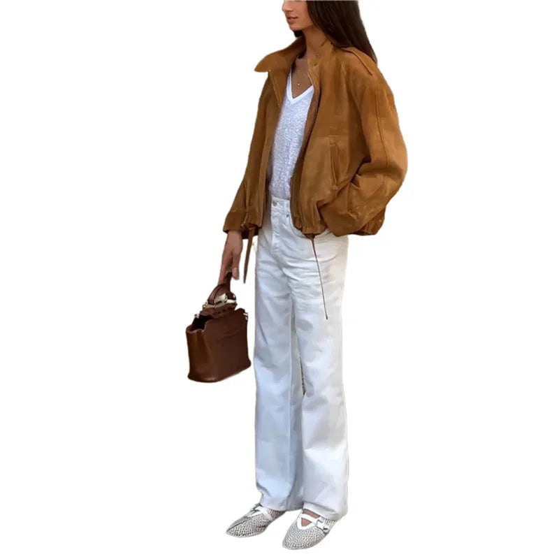 Men's solid colour retro loose fit long sleeve jacket on a hanger.
