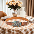 Men's black imitation leather belt with detailed alloy cow head buckle and pin fastening