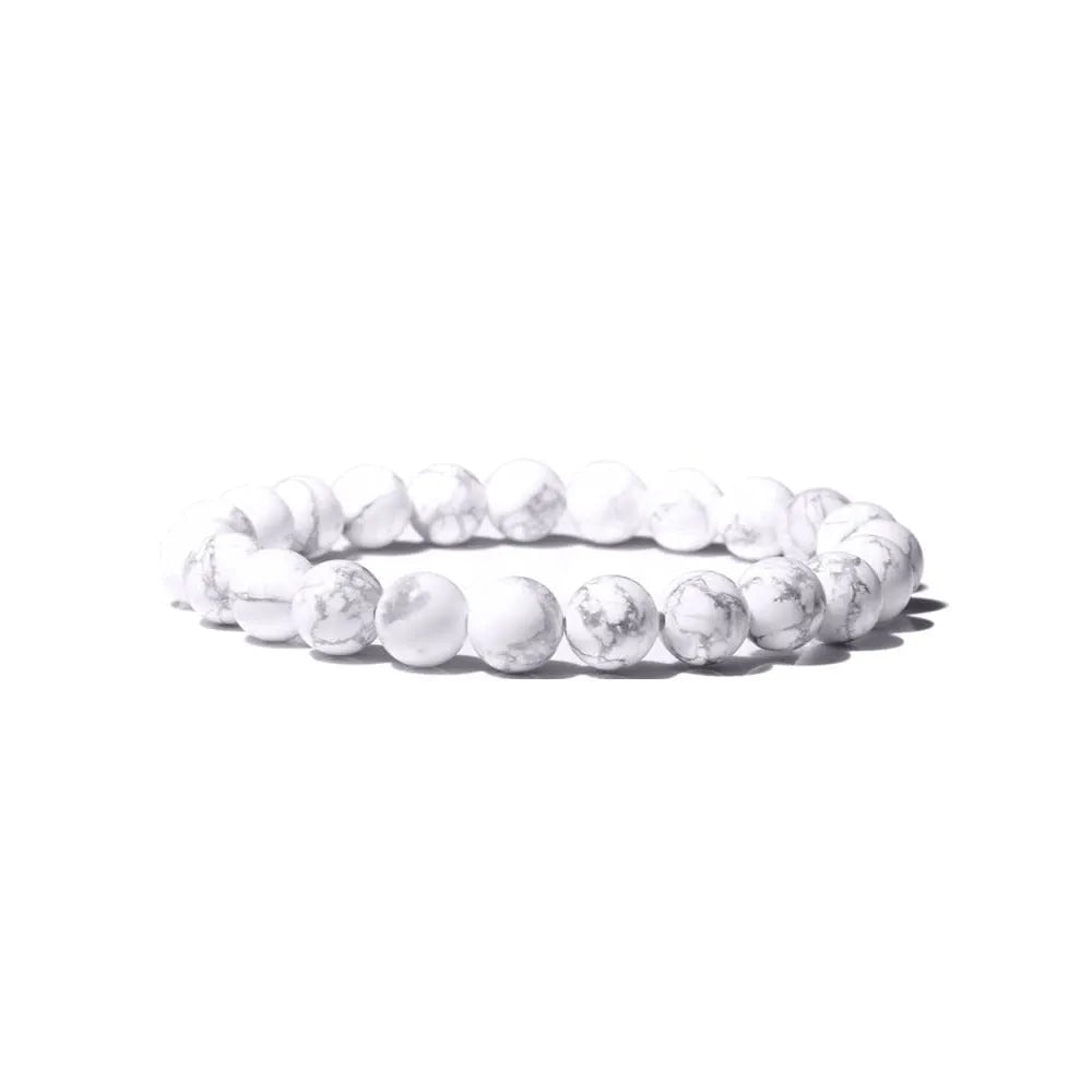 Handmade 8mm agate stone bead bracelet for women shown in one of fourteen available colours.
