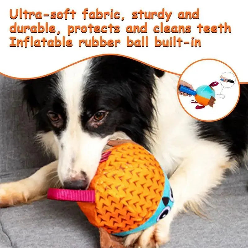 Orange Owl Ball interactive dog toy with velvet surface and rubber core on white background